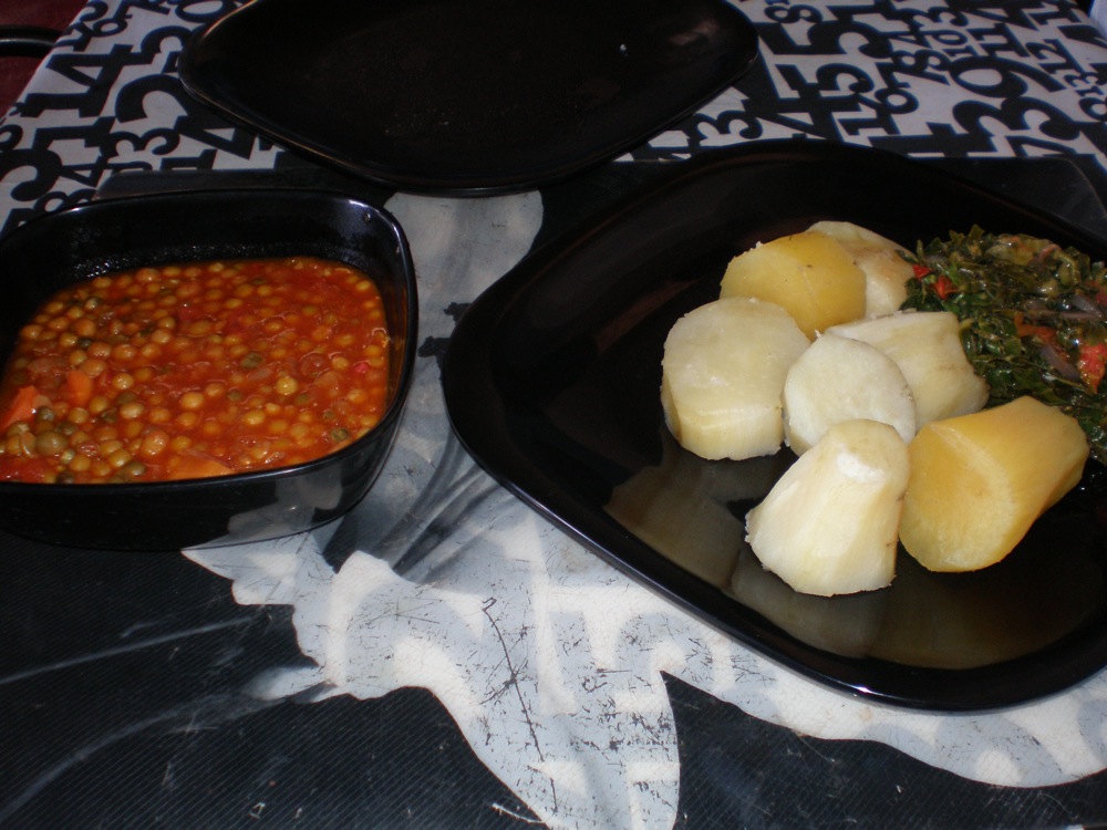 Standard Ugandan meal of peas, sweet potato and greens